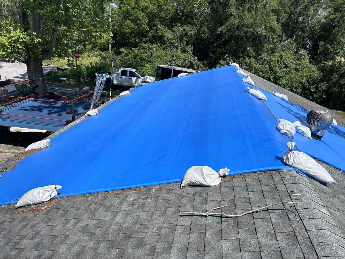 Daily Communication Cadence Between Tarping Crews and Field Adjusters