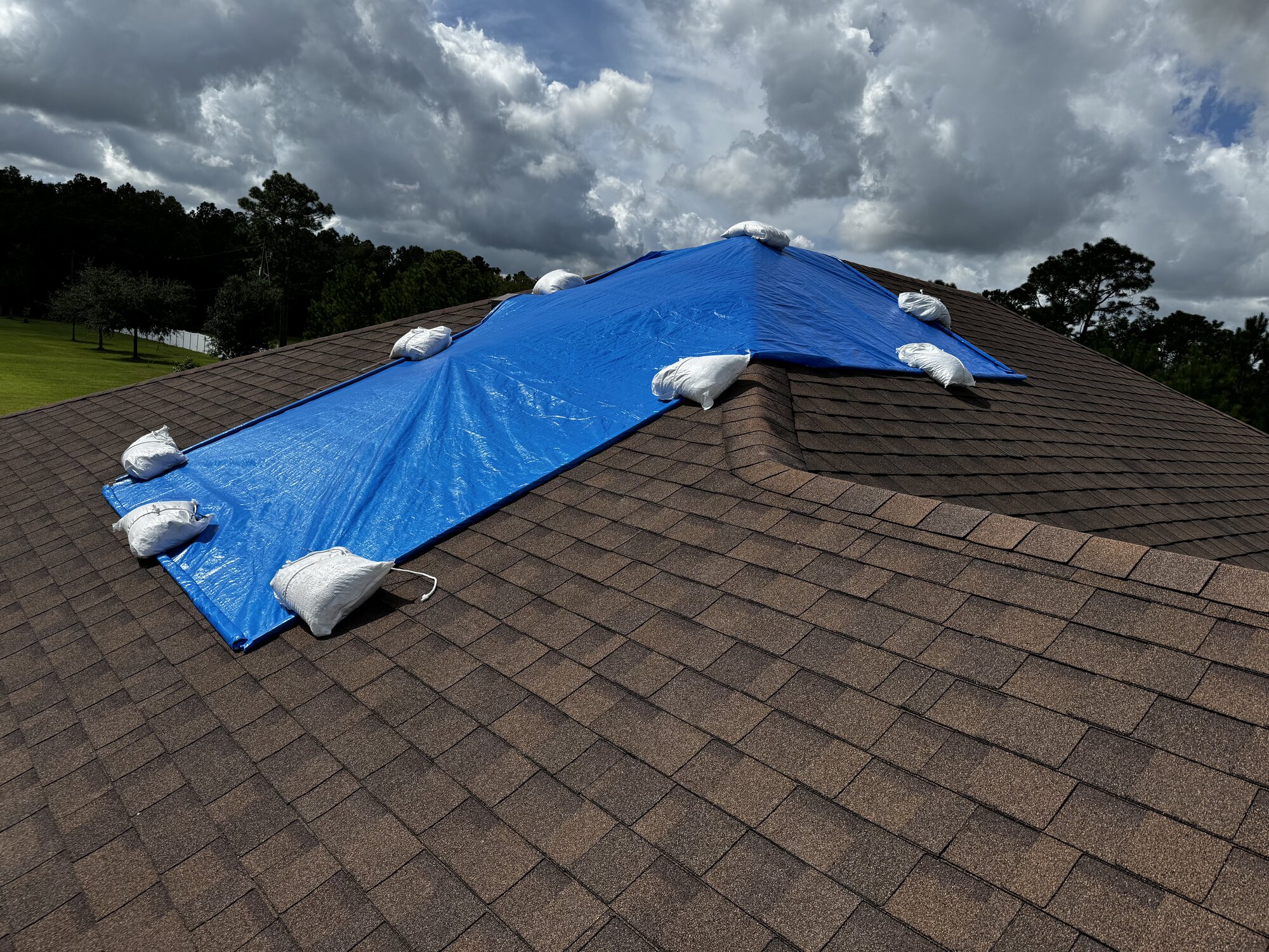 Residential storm damage tarping - Xactware compliant installation photos