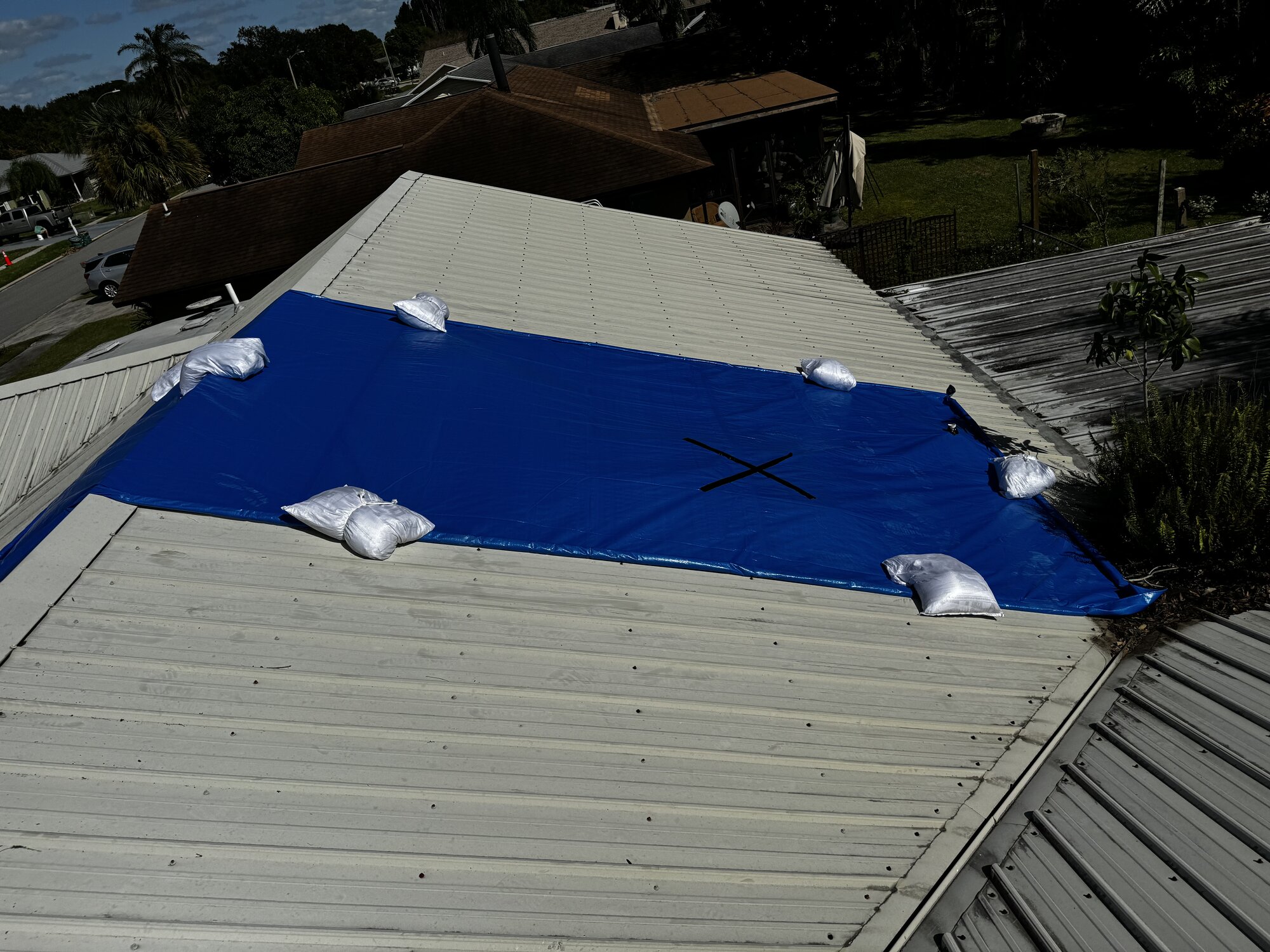Catastrophe response tarping - insurance carrier approved photos