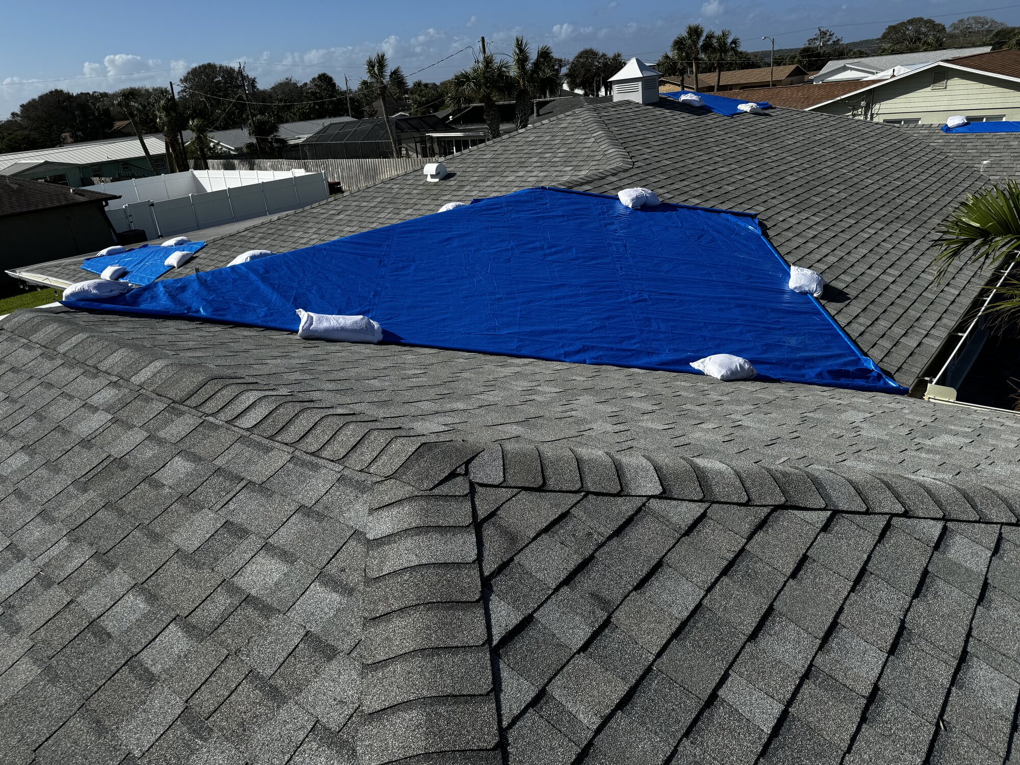 Rapid deployment roof tarping - field adjuster verification photos