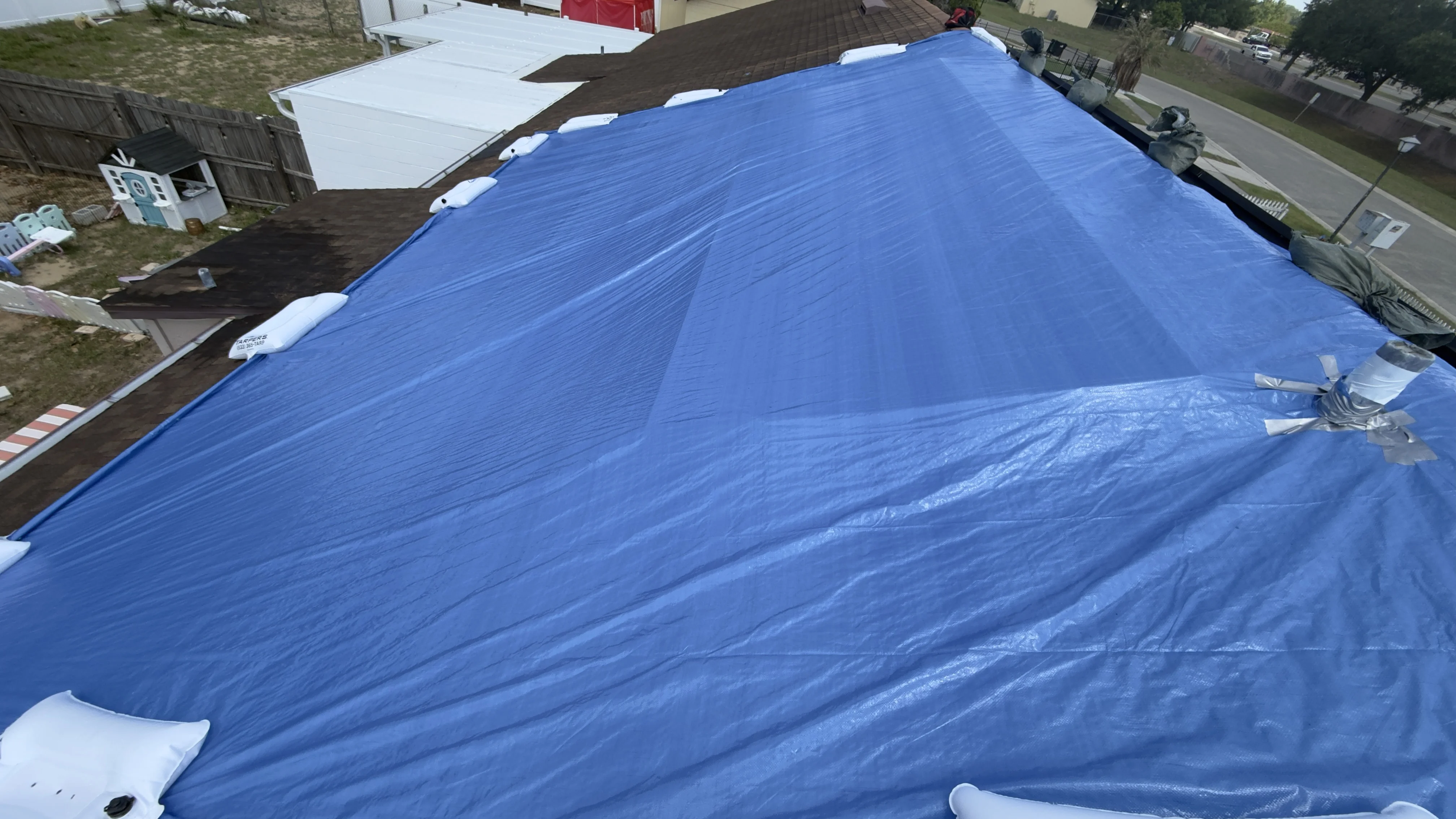 When TarpBags® Outperform Sandbags for Insurance Grade Roof Tarping